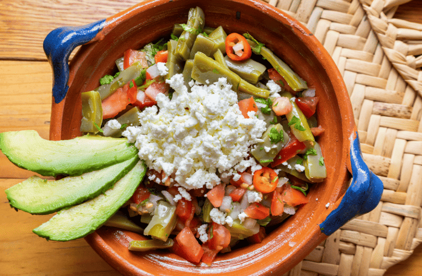 diced cactus with peppers, avocados, and cojita cheese
